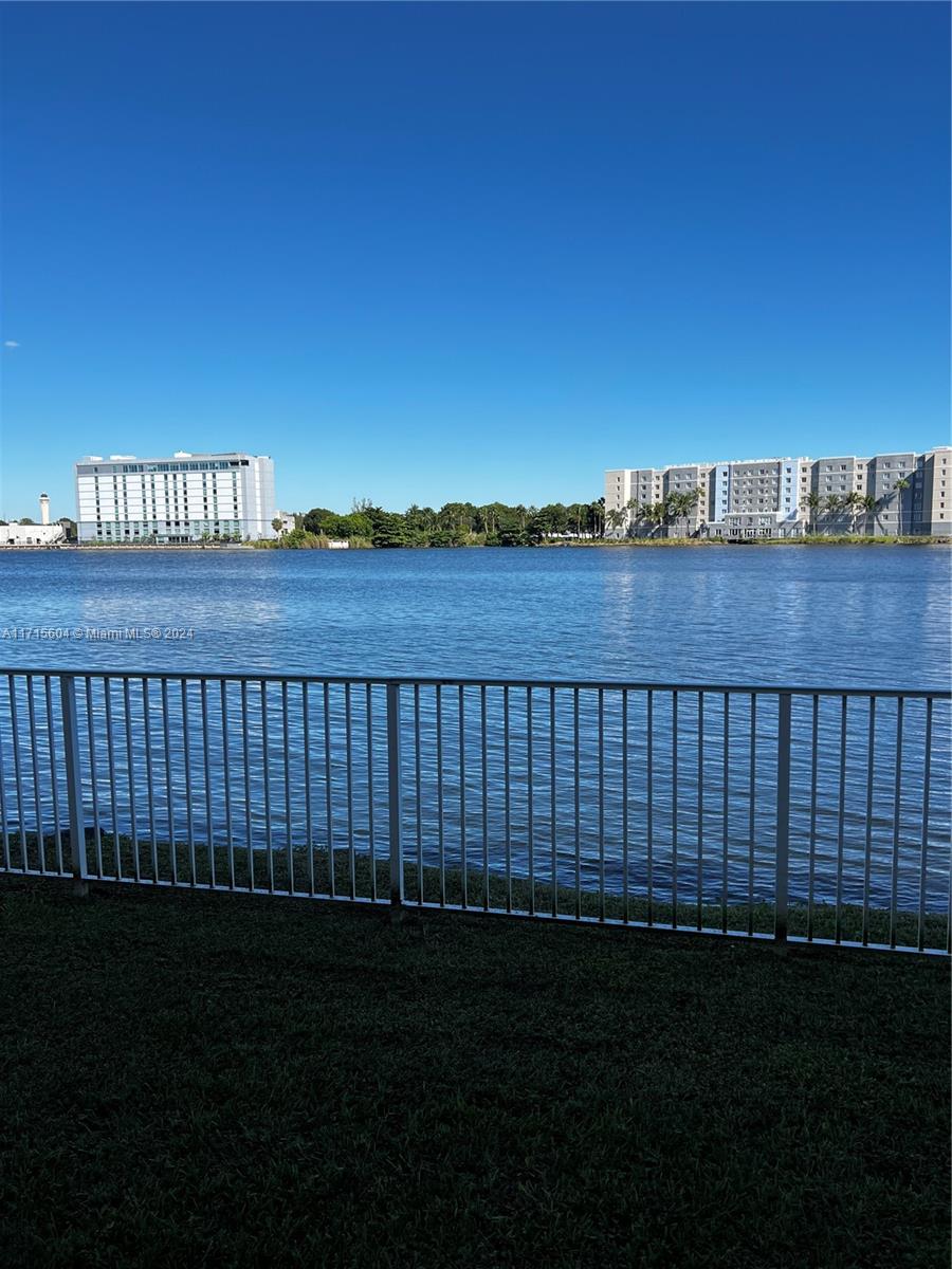 a view of a balcony and lake