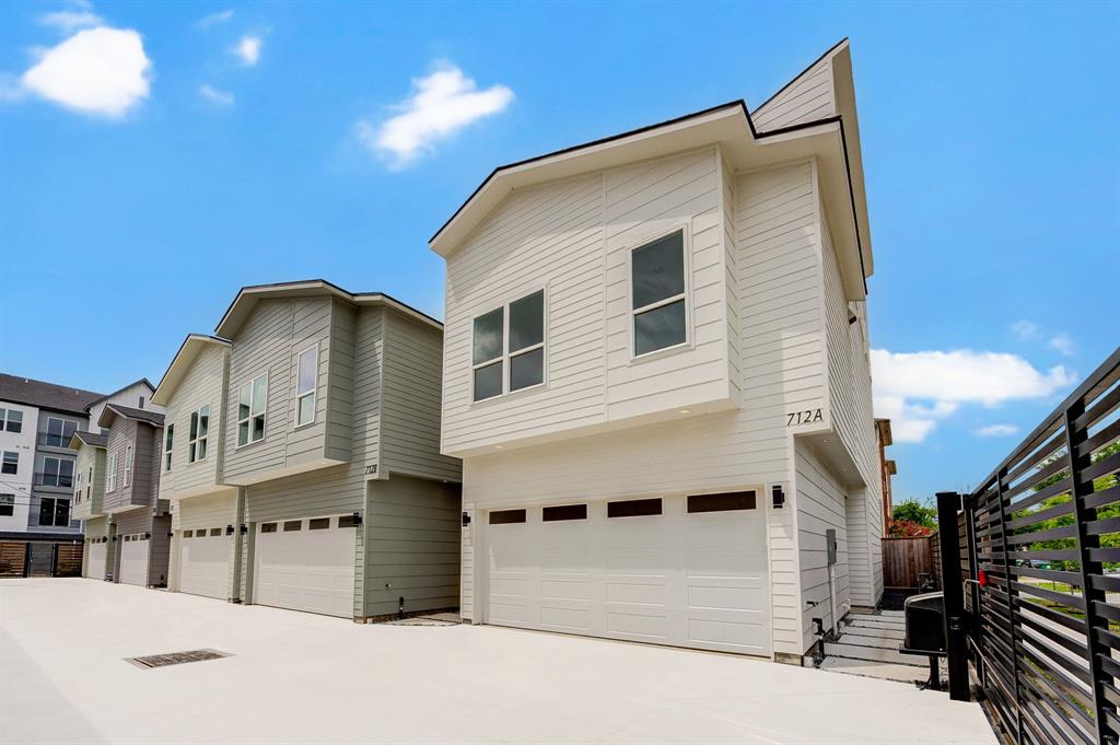 a front view of a house with a garage