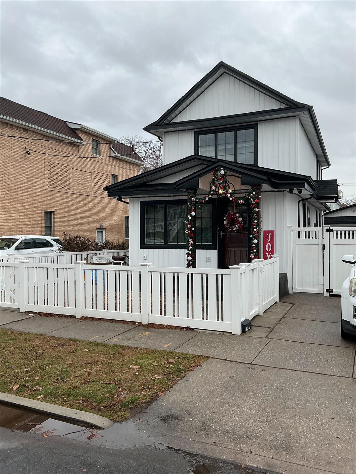 a front view of a house with a porch