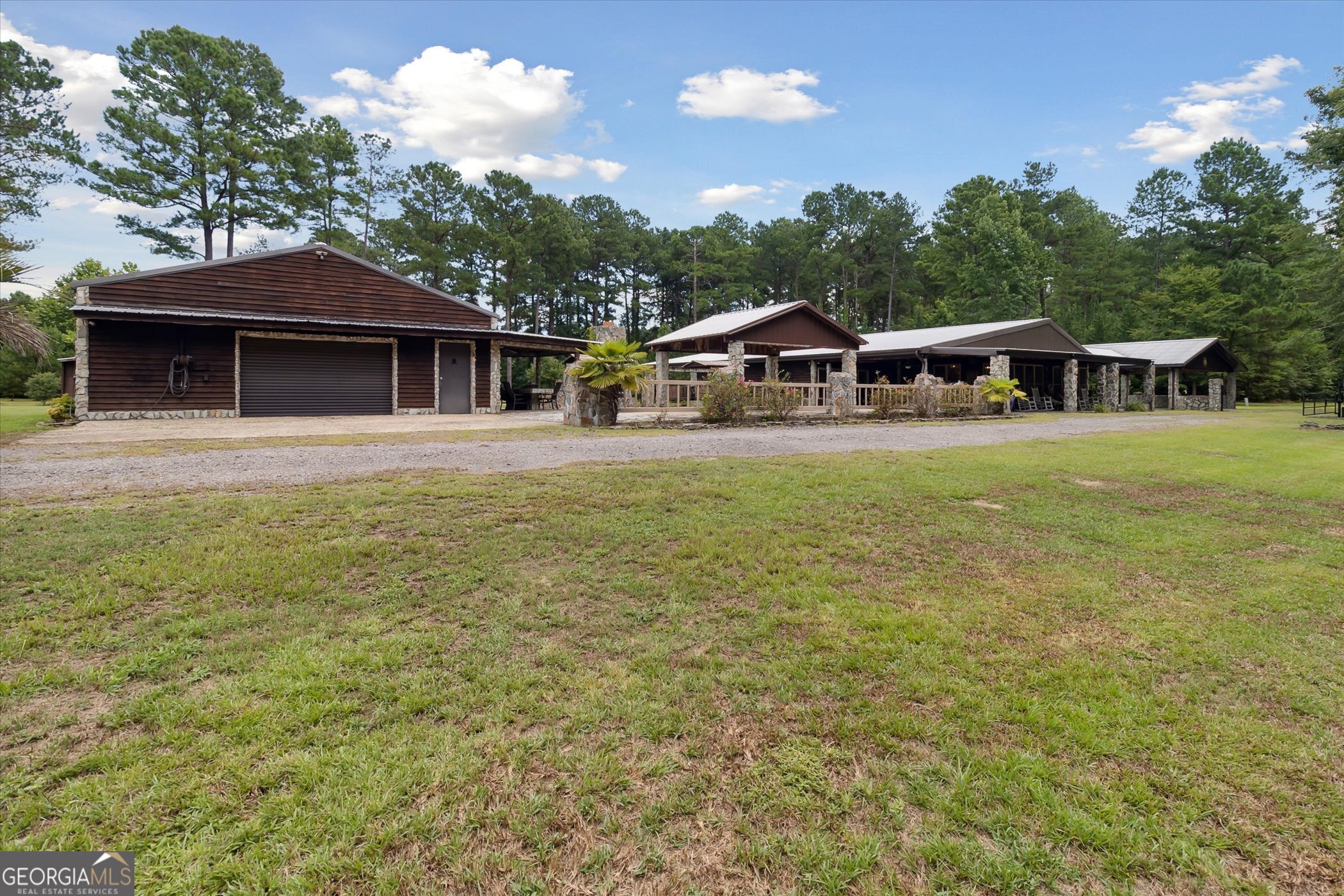 a front view of a house with yard