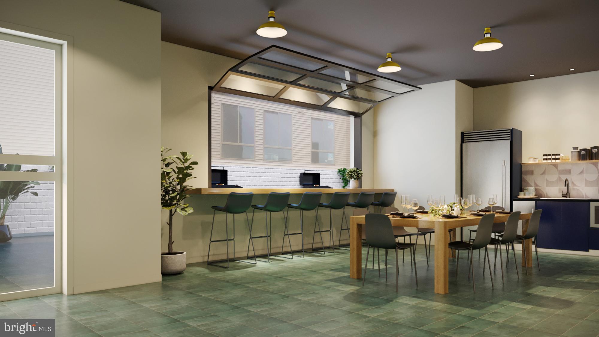 a kitchen with stainless steel appliances table chairs and stove