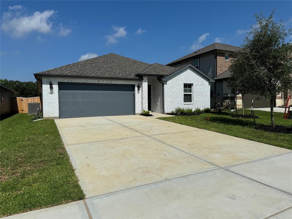 a front view of a house with yard