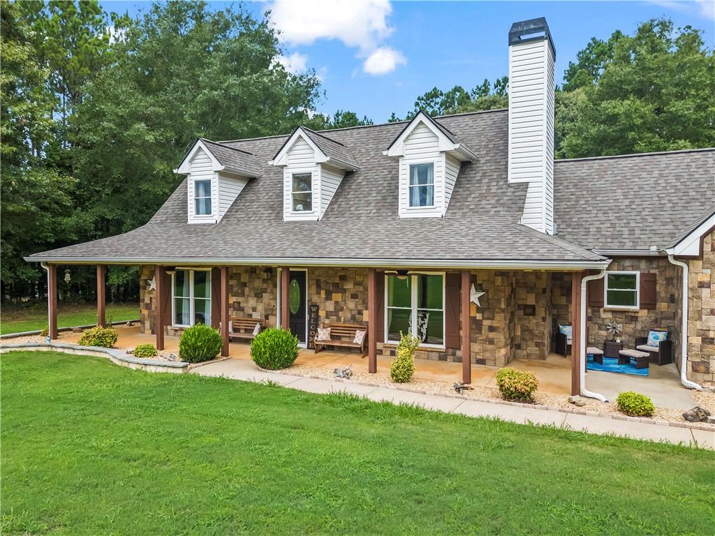 front view of a house with a yard