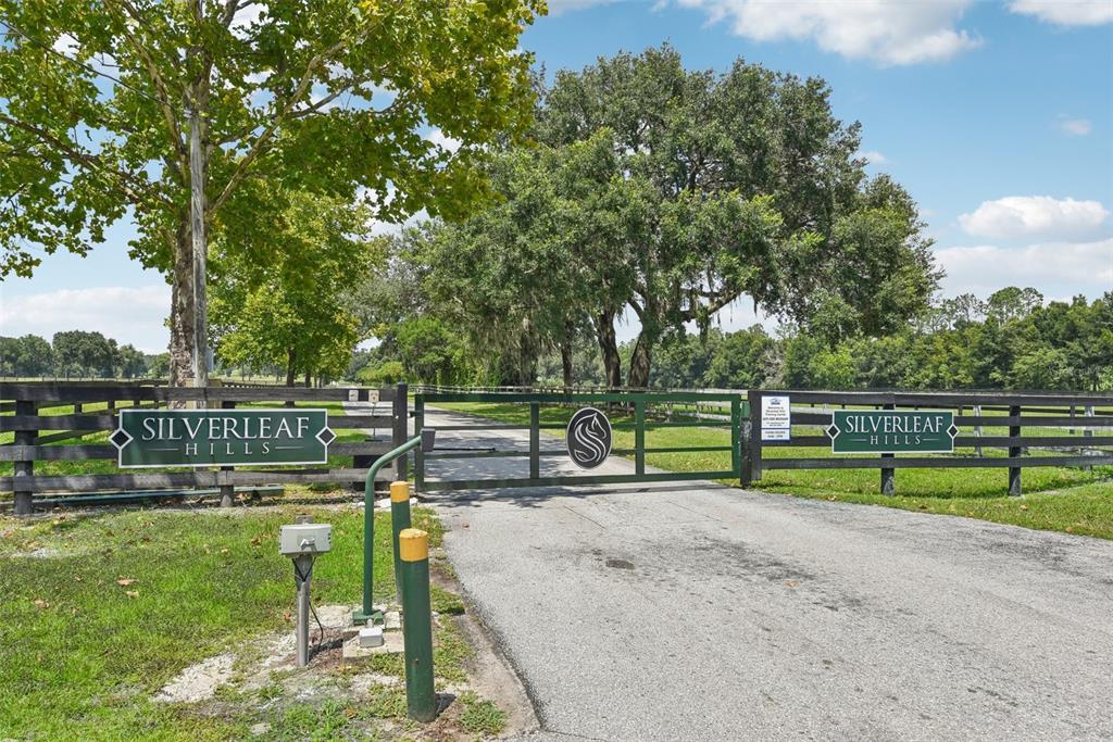 a view of park with an outdoor seating