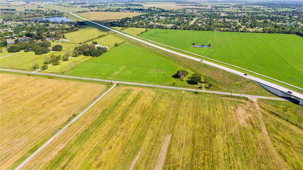 THIS TRIANGLE PIECE ON 602 AND 99 IS WHAT IS FOR SALE. SEE THE DRIVEWAY BY THE TREES