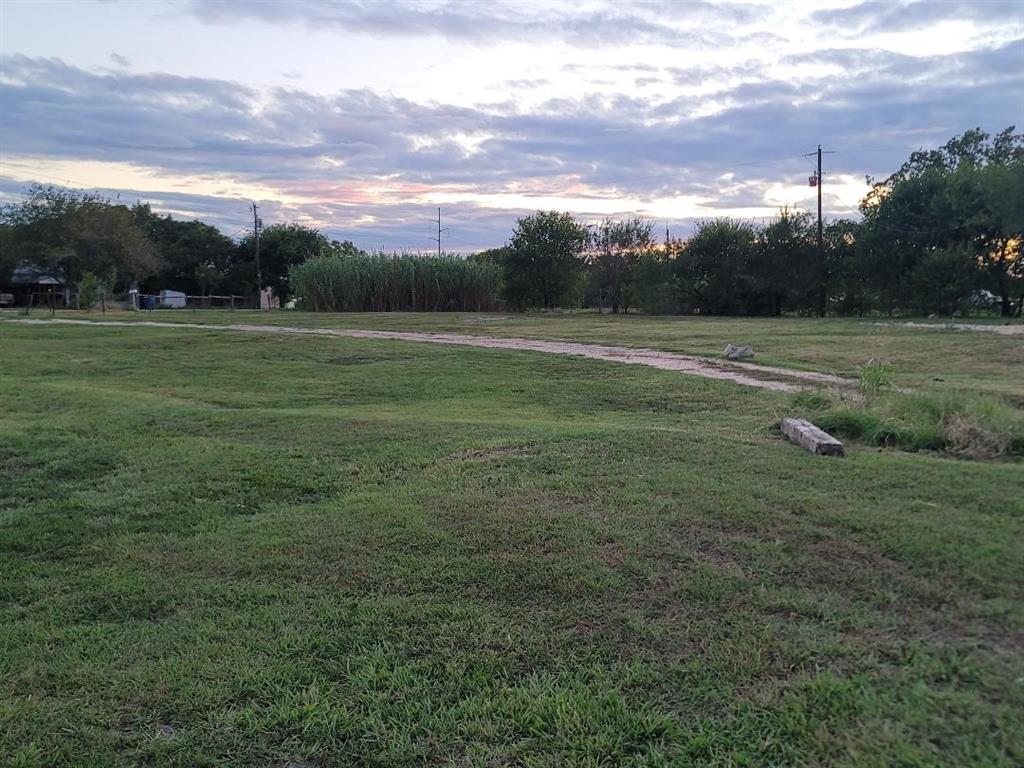 a view of outdoor space with green field