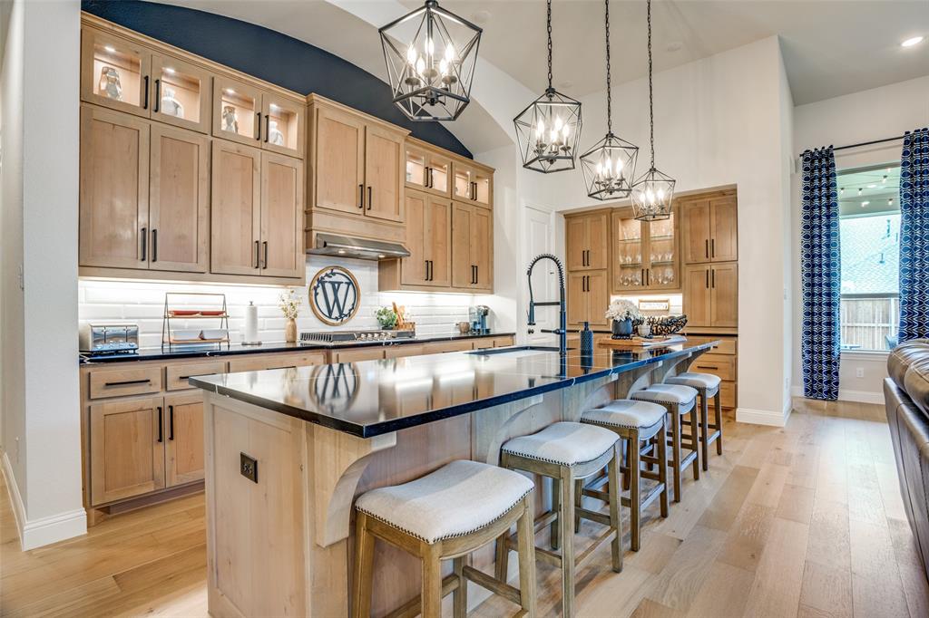 a kitchen with granite countertop lots of counter top space and stainless steel appliances