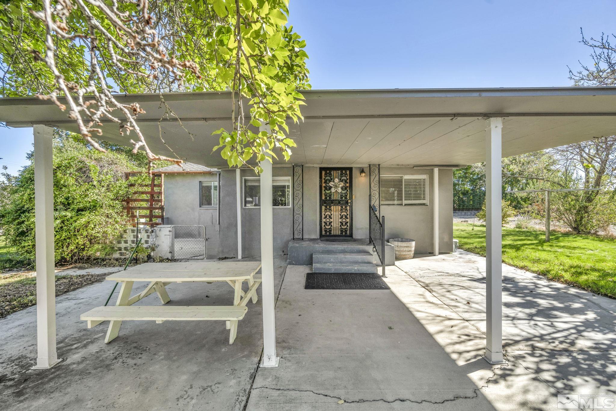 a house view with a outdoor space