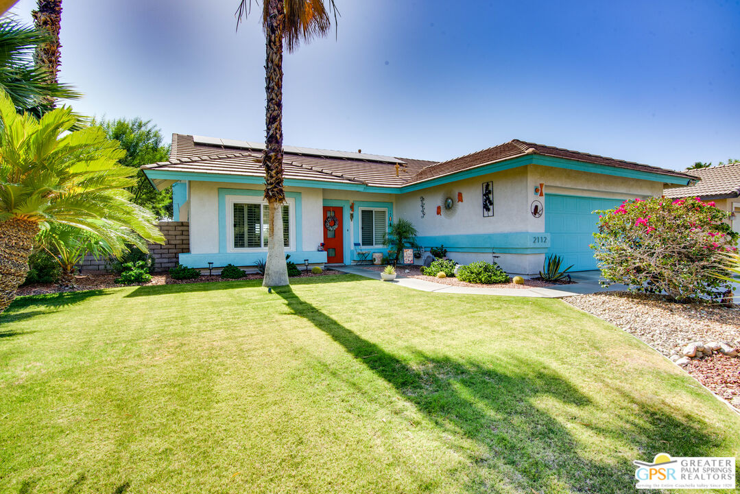 a front view of house with yard