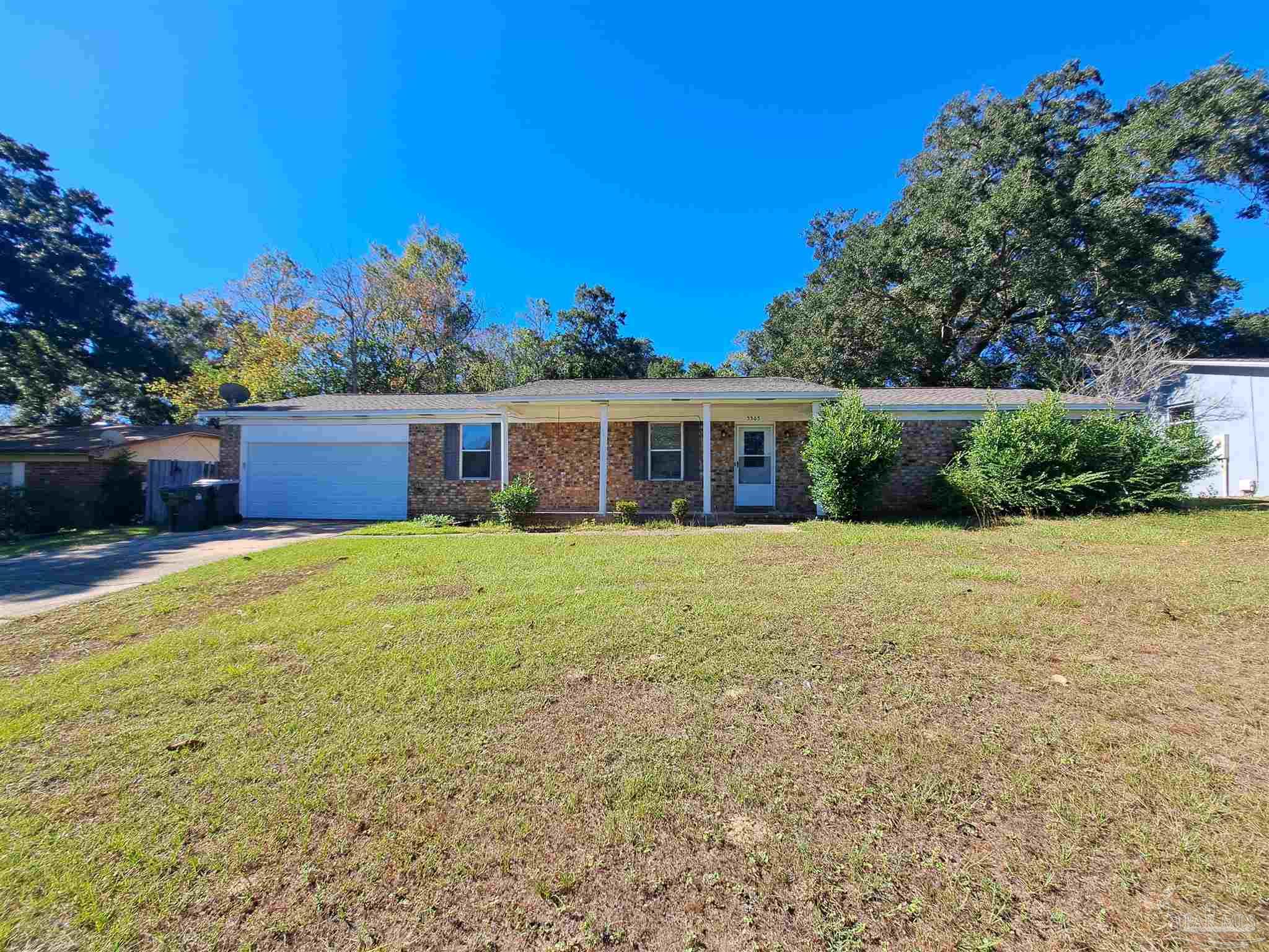 front view of house with a yard