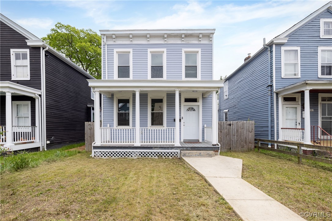 a front view of a house having yard