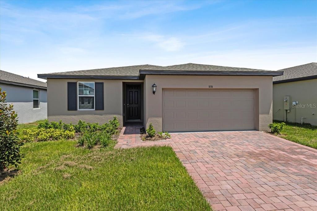 a front view of house with yard