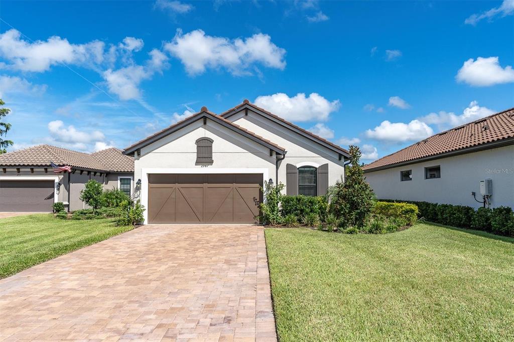 STUNNING POOL/SPA HOME ON POND IN GATED ESPLANDE AT STARKEY RANCH