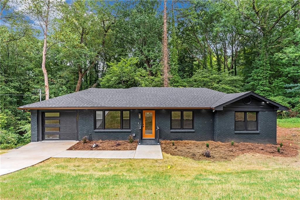 a house with trees in the background