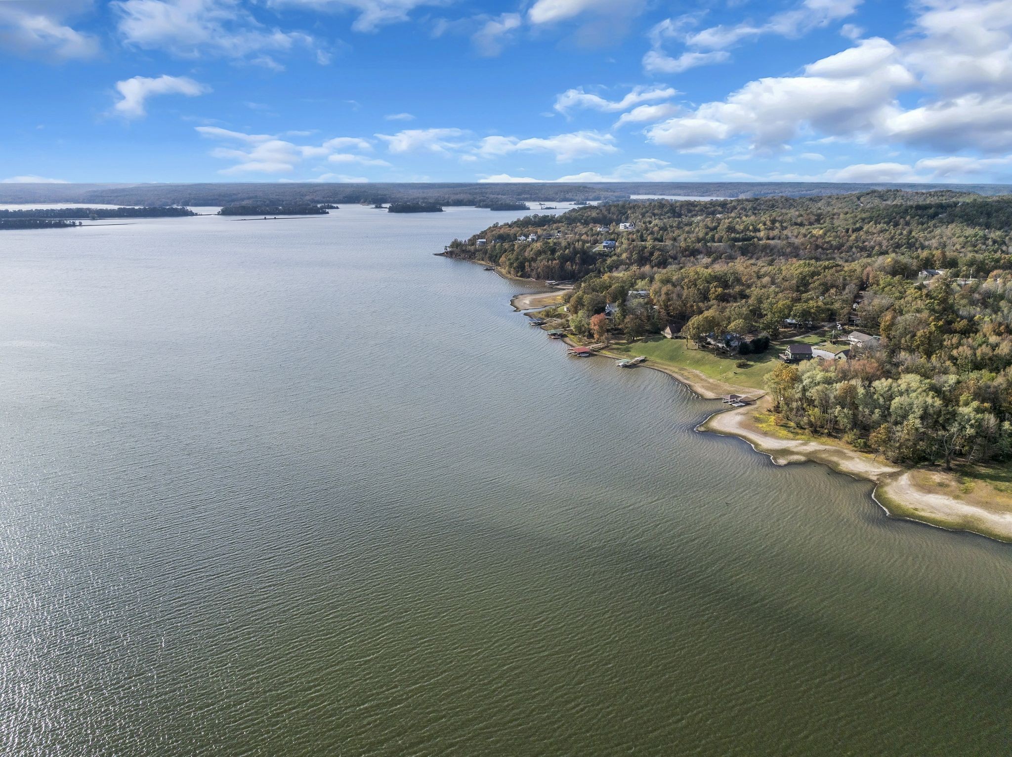 a view of a lake with a city