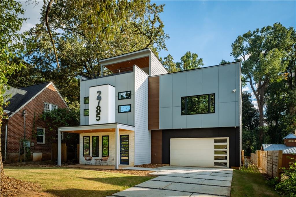 a view of a house with a swimming pool