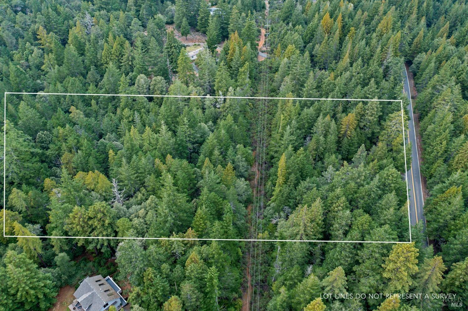 a view of a fence and trees