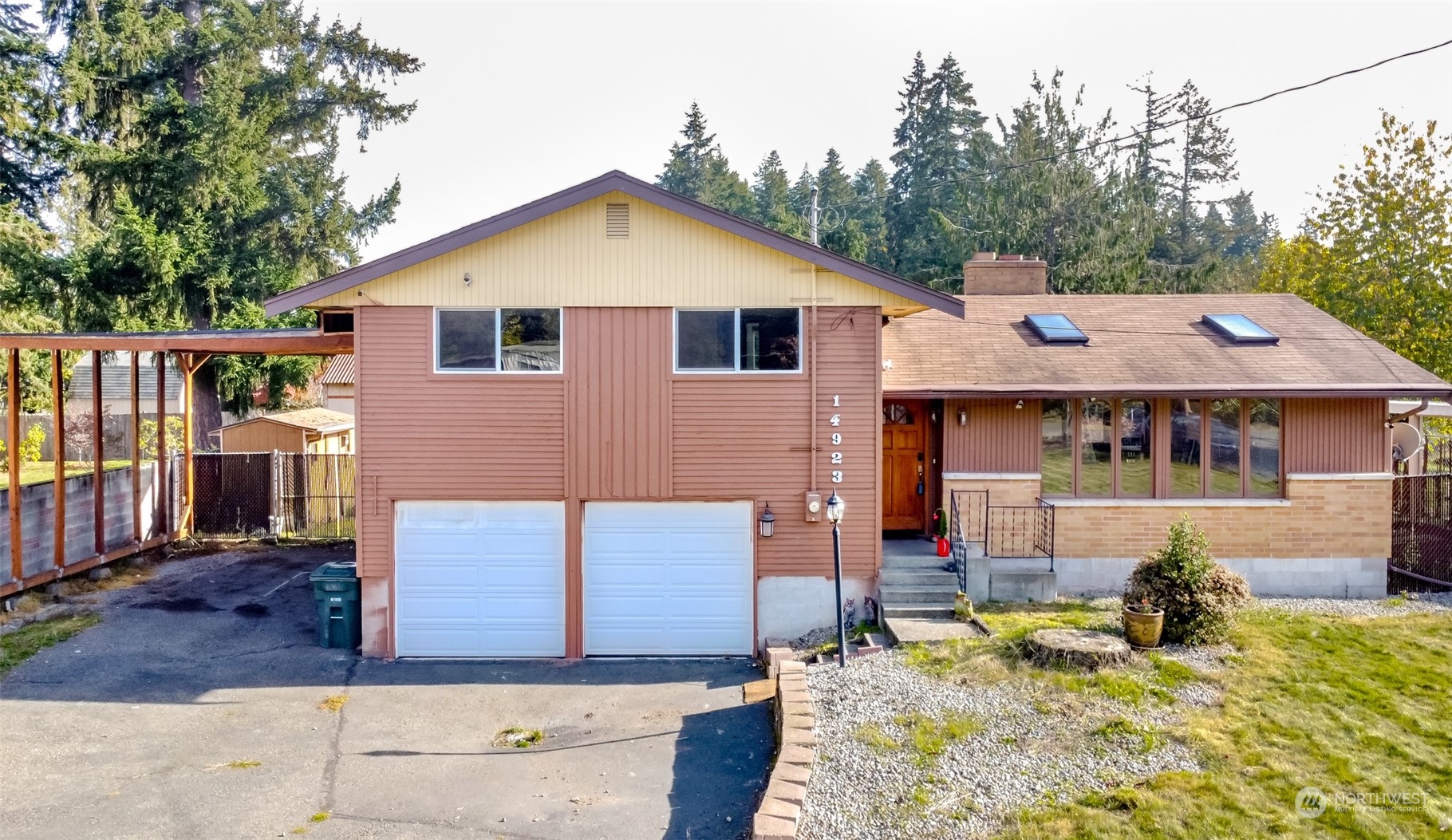 front view of a house with a yard