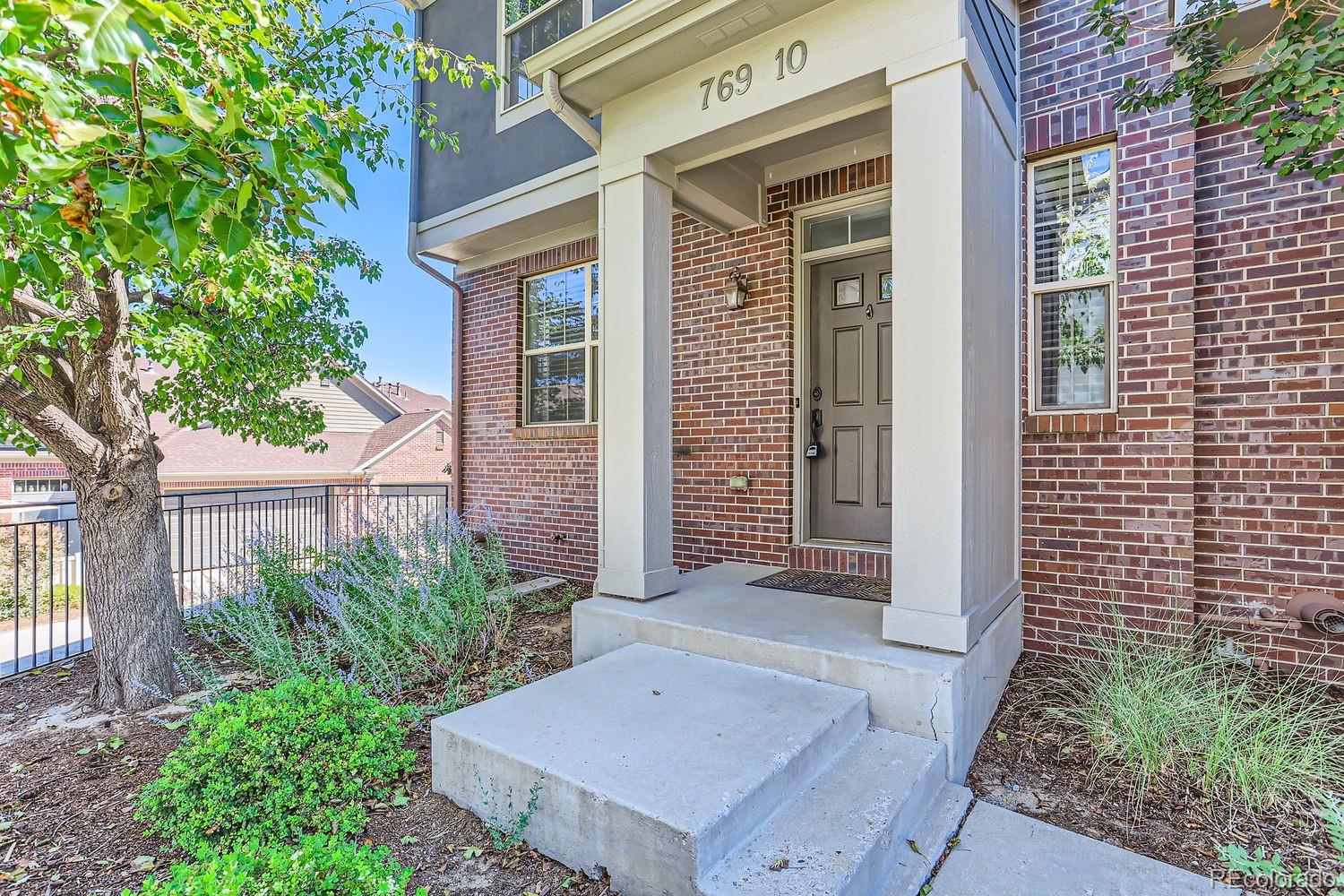 front view of a house with an outdoor space