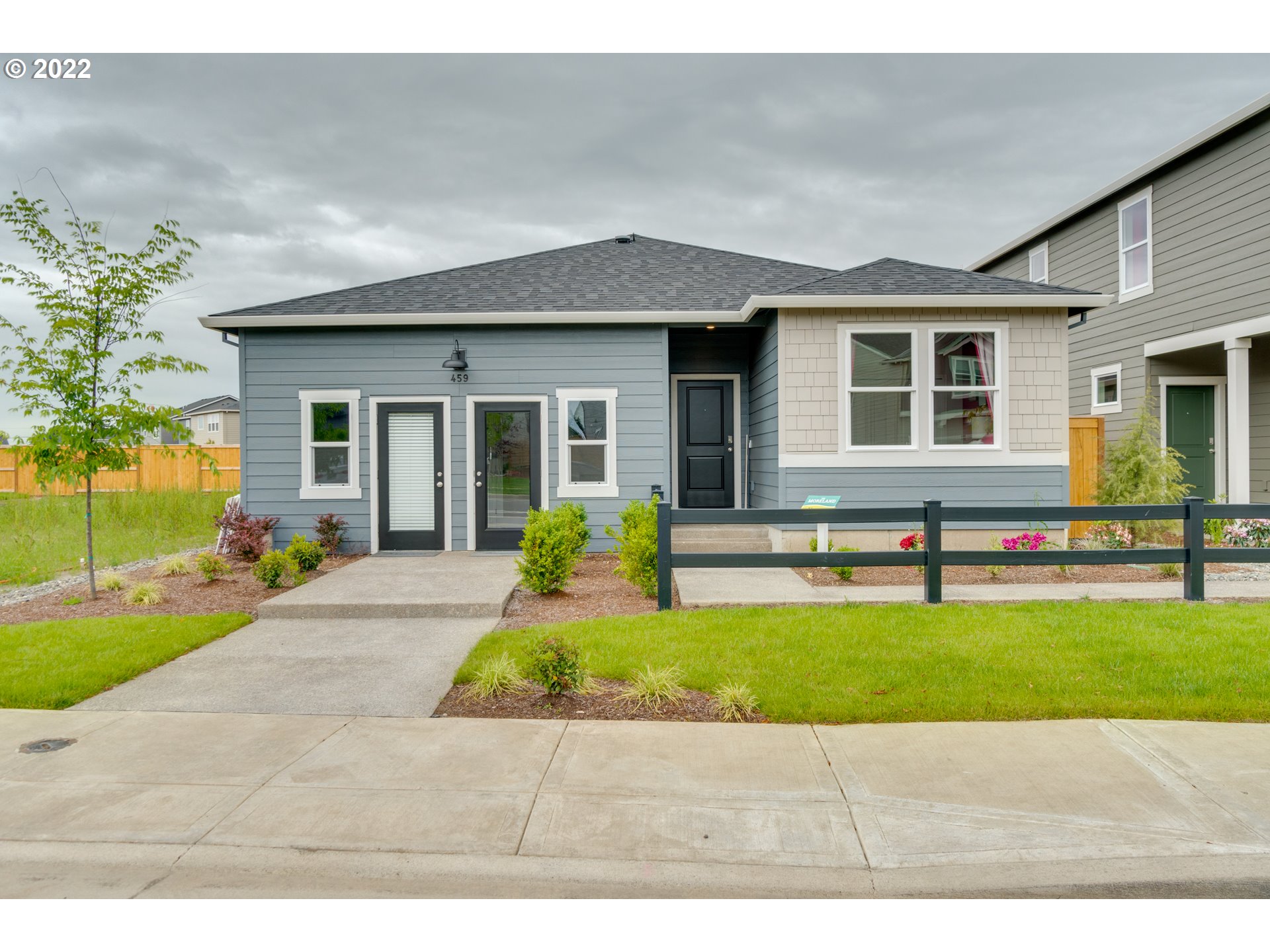 a house view with a garden space