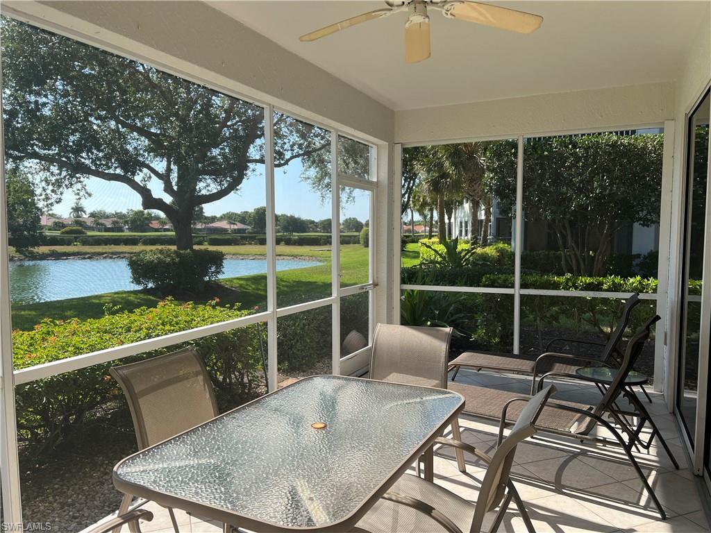 a view of a balcony with lake view and wooden floor