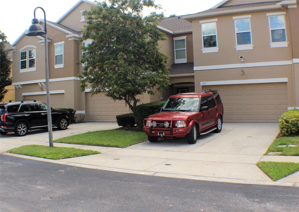 a car parked in front of a house