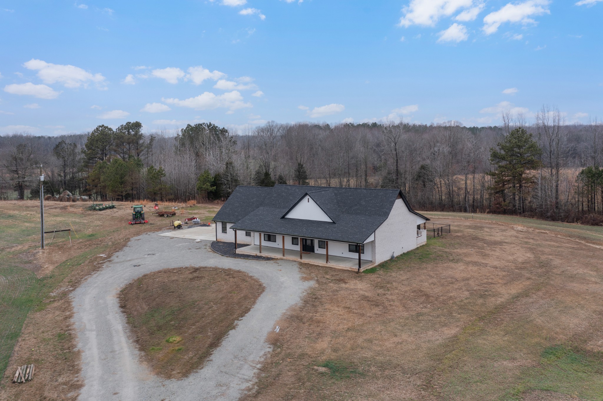 a view of a town with barn house