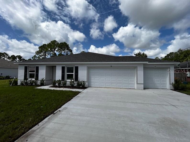 front view of house with a yard