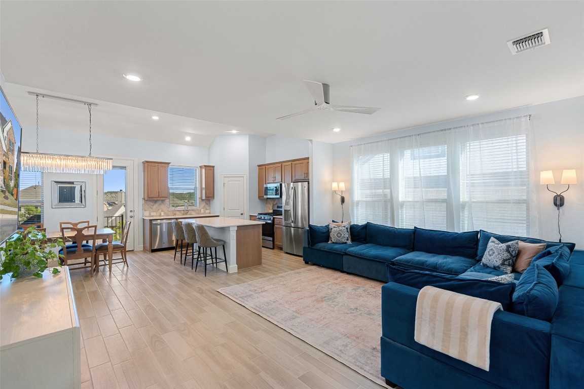 a living room with furniture and a table