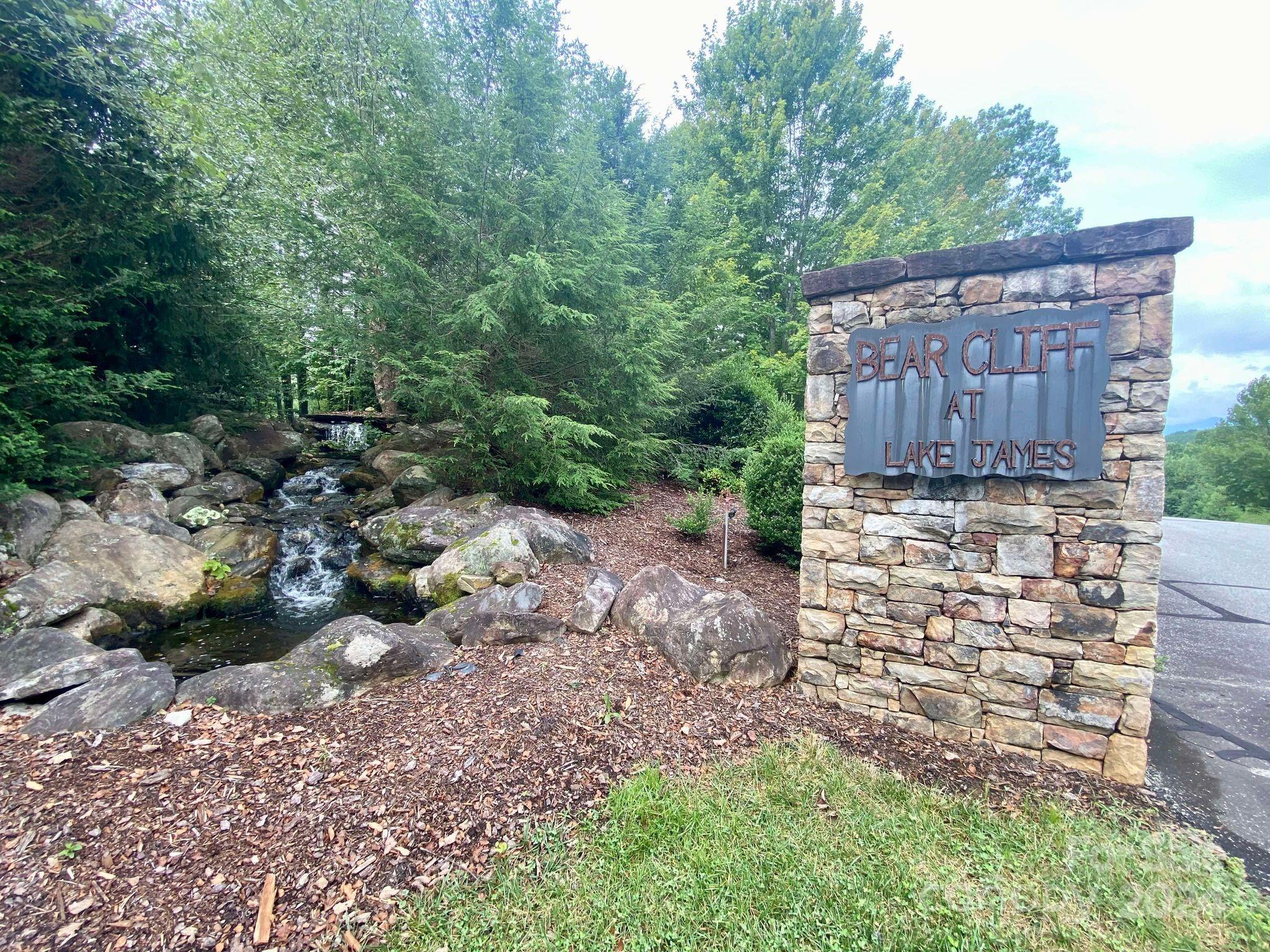 a view of a pathway with a yard