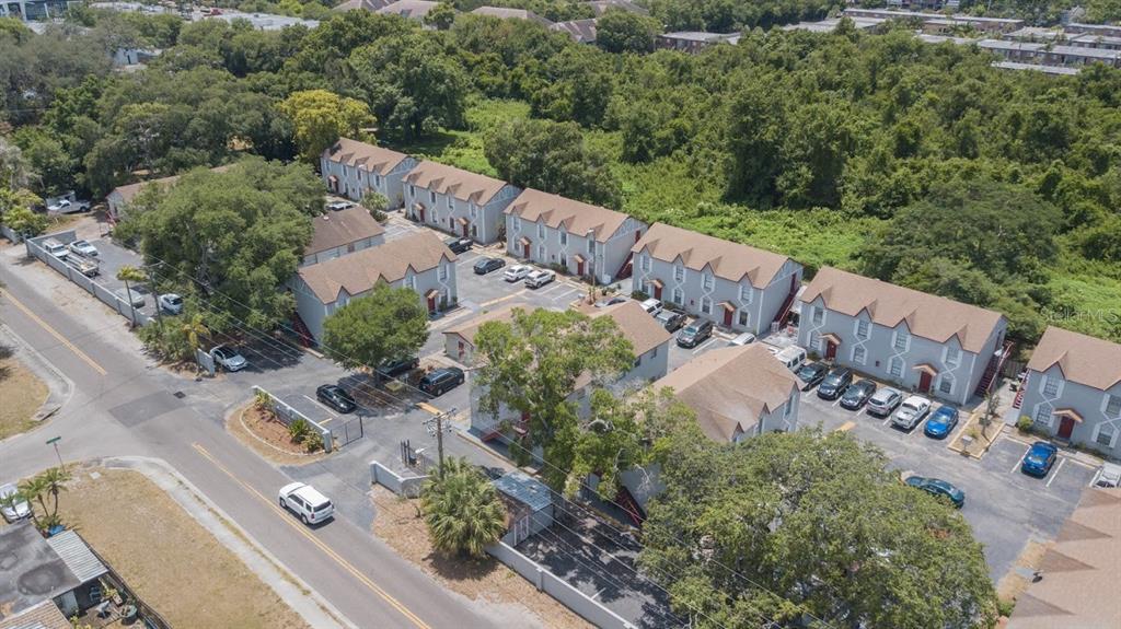 an aerial view of house with yard