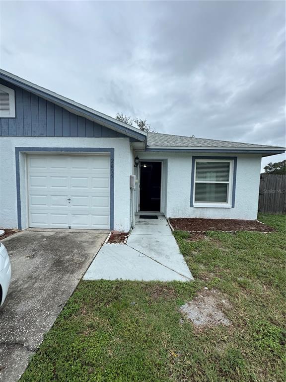 a front view of house with yard