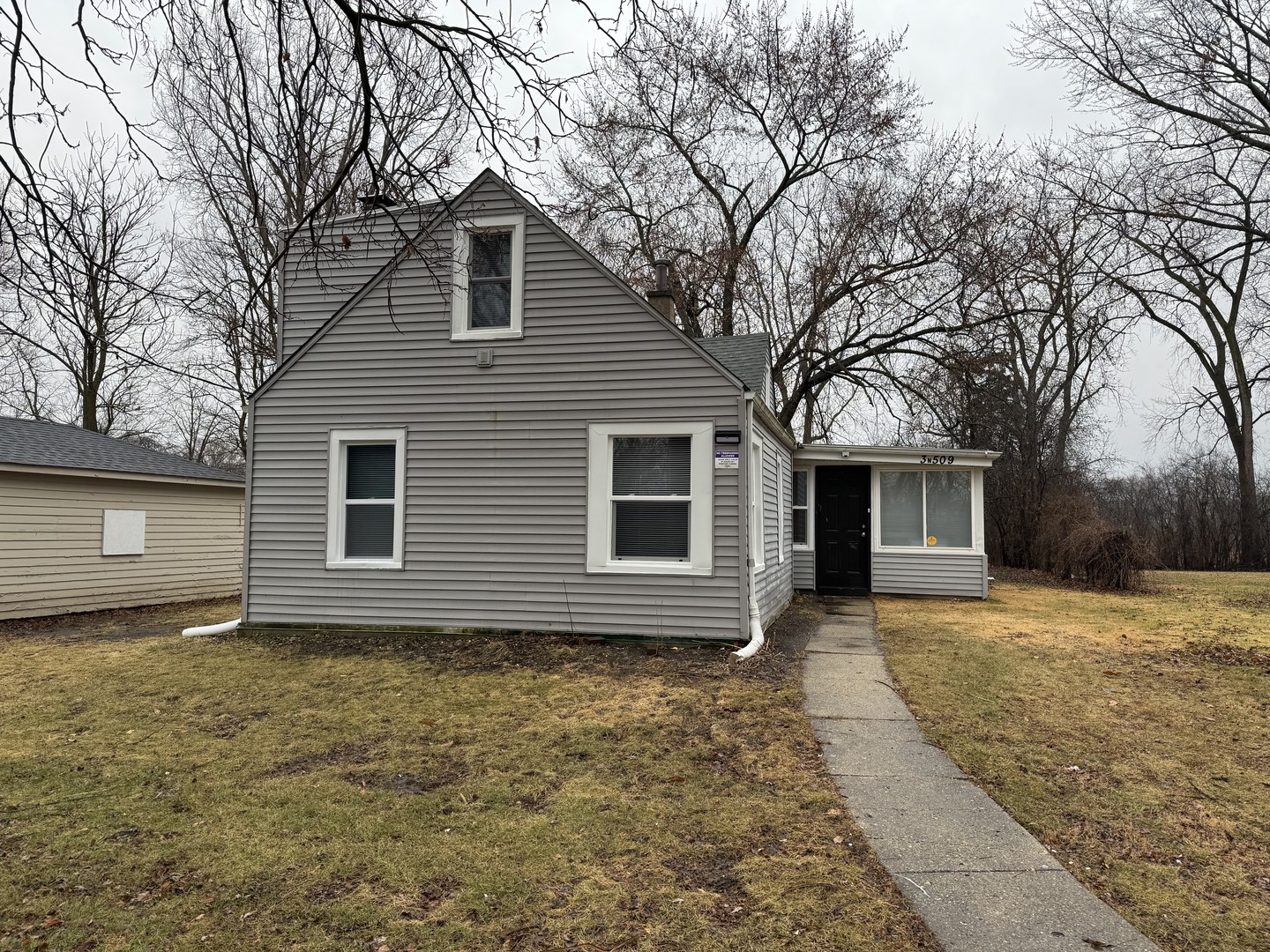 a house that has a window in front of it