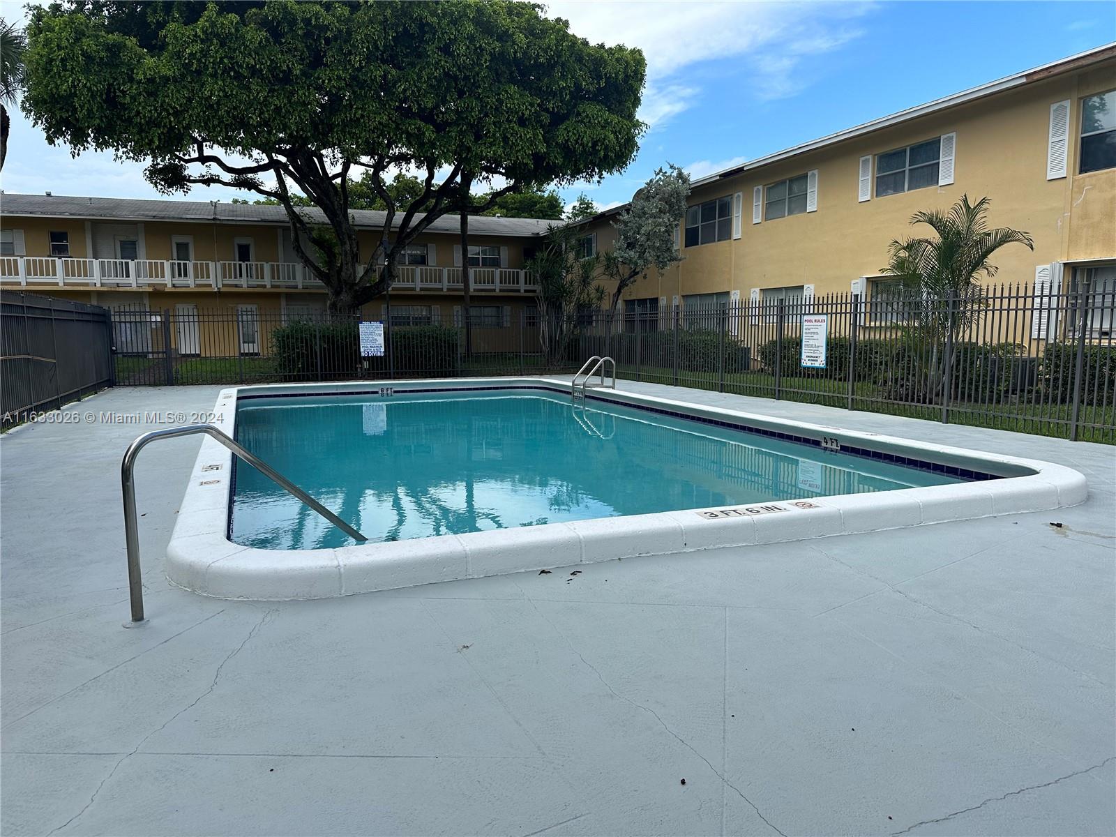 a view of outdoor space yard swimming pool and furniture