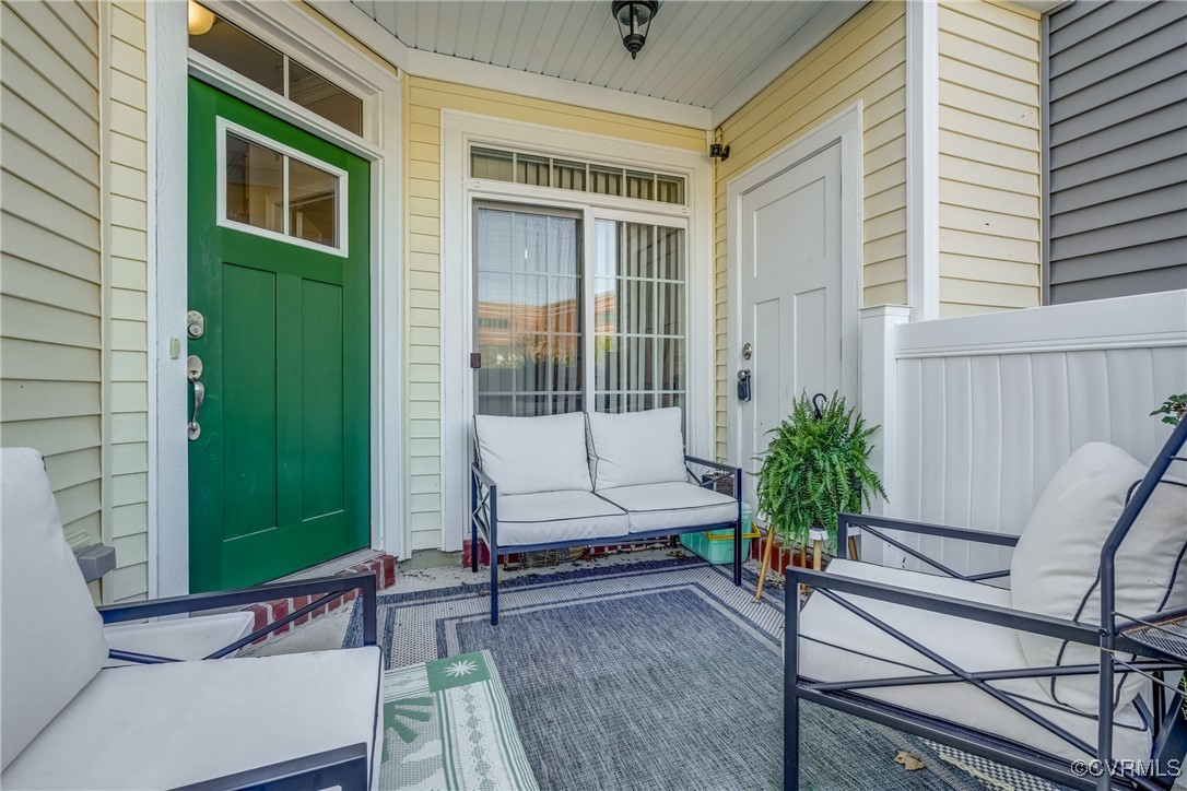 Property entrance featuring covered porch