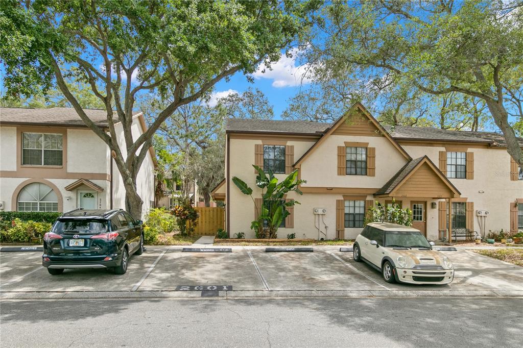 a view of a car park in front of house