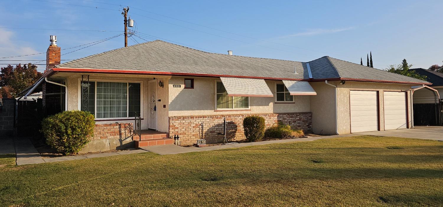 a front view of a house with patio