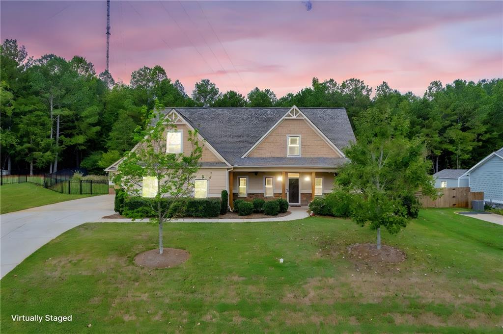 a aerial view of a house with a big yard