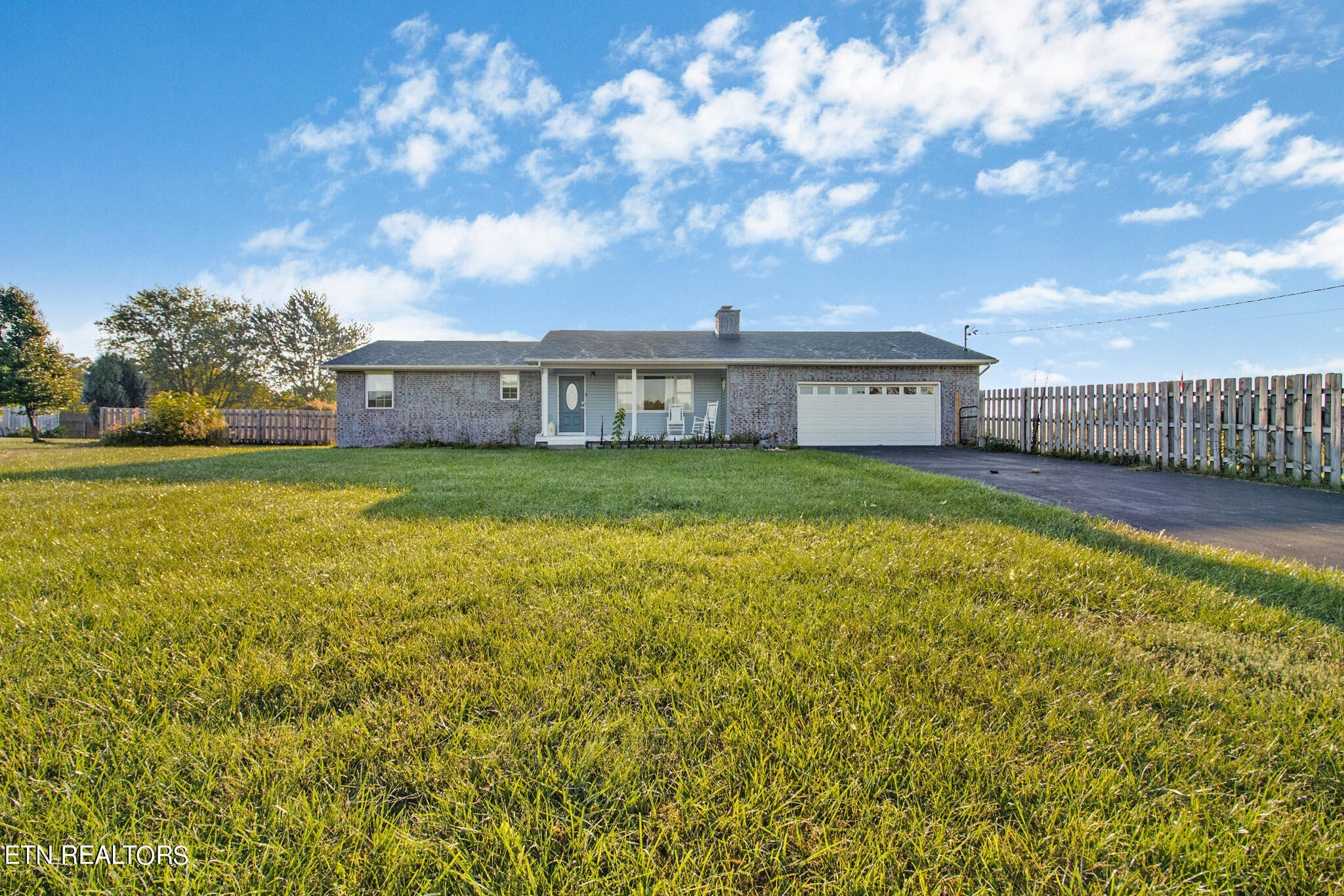 a view of a house with a big yard