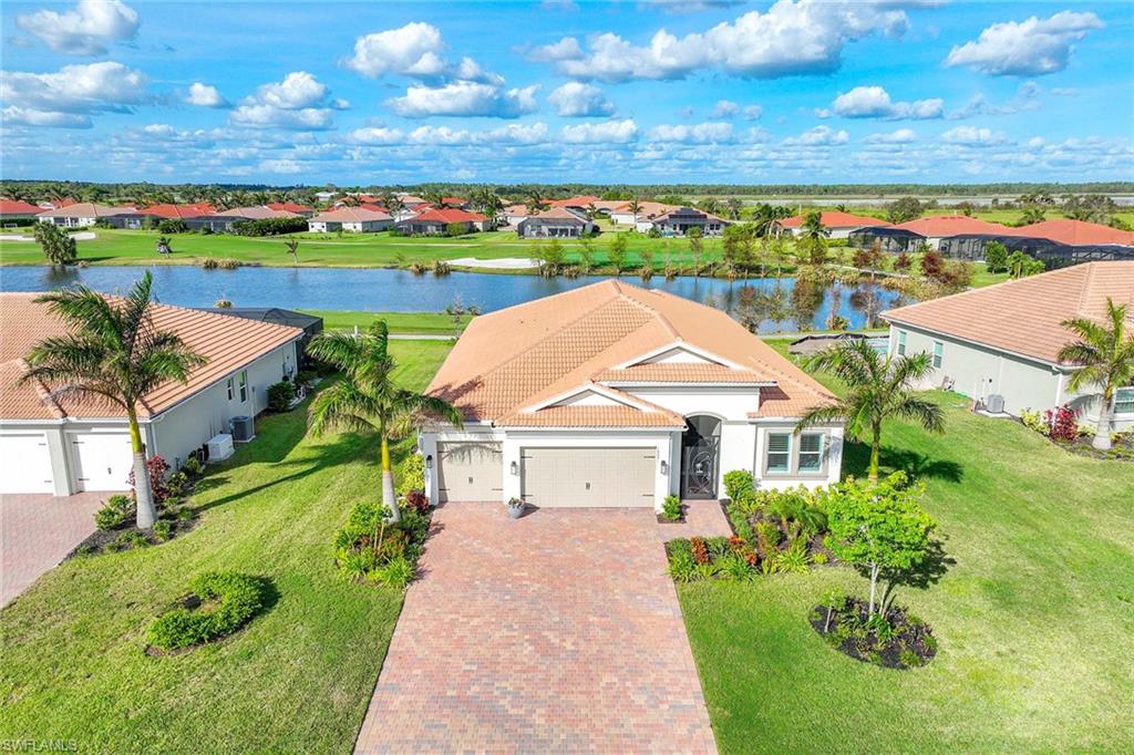 an aerial view of a house with a garden