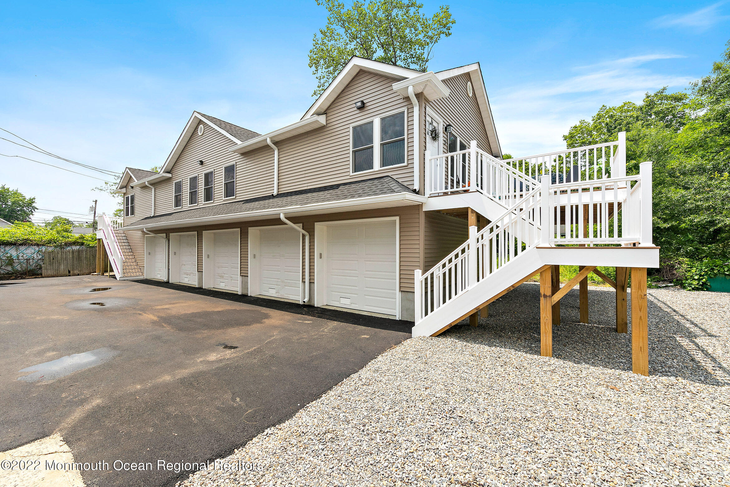 a view of a house with a roof deck