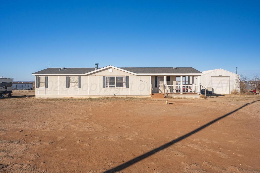 a front view of a house with yard