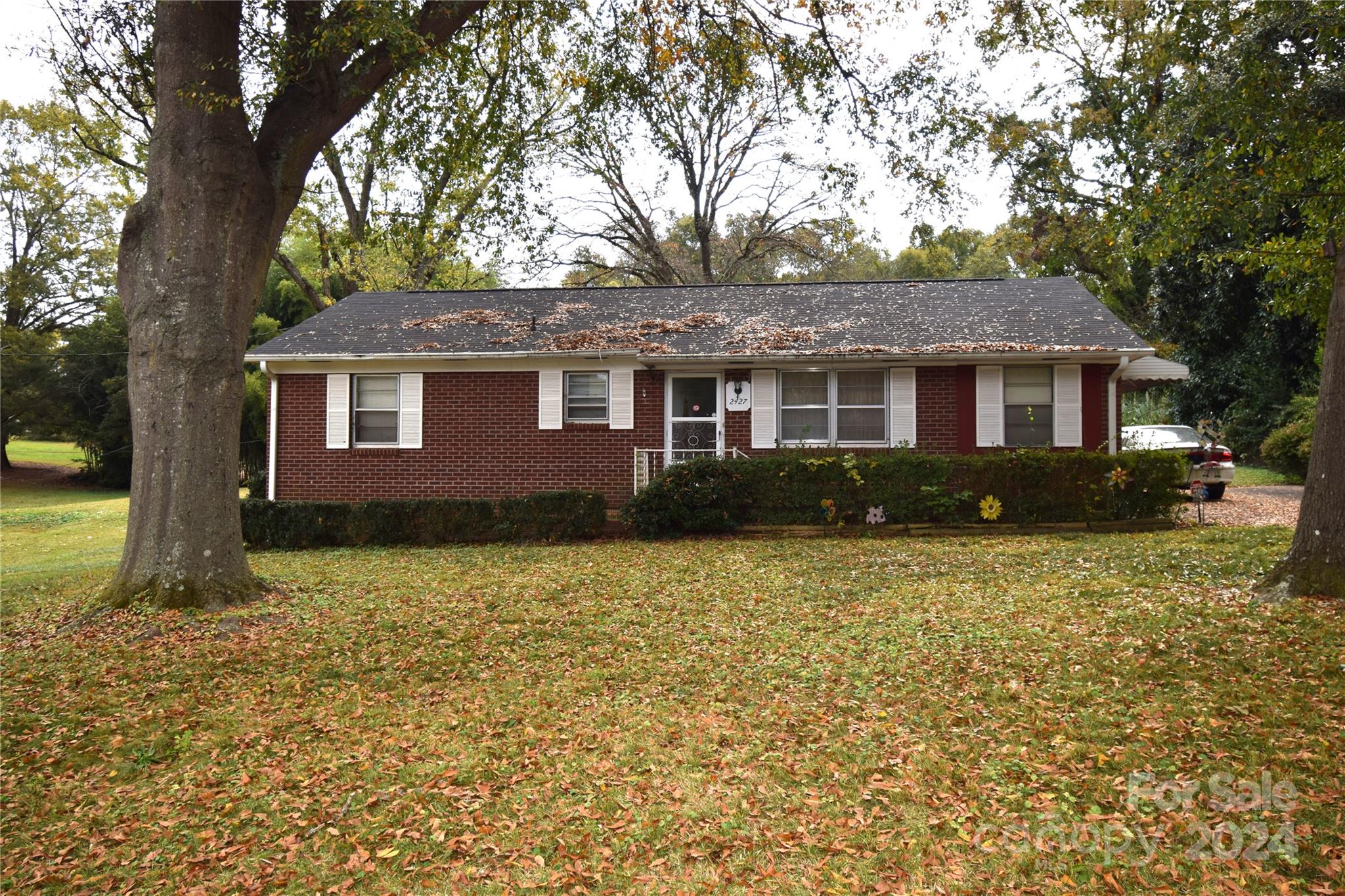 front view of a house with a yard