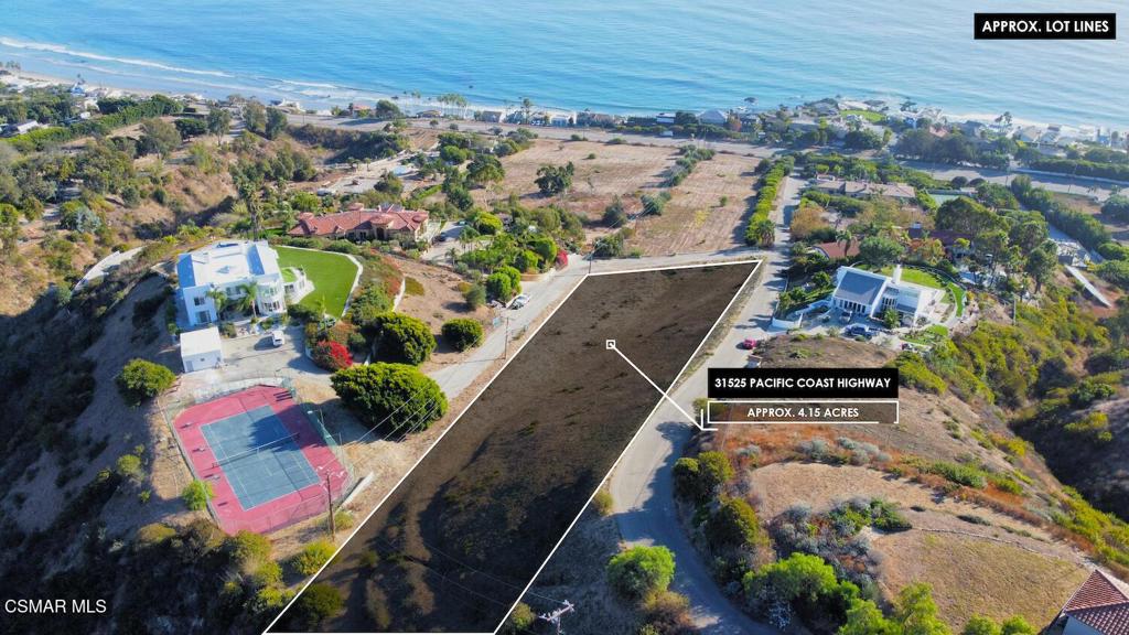 an aerial view of house with yard