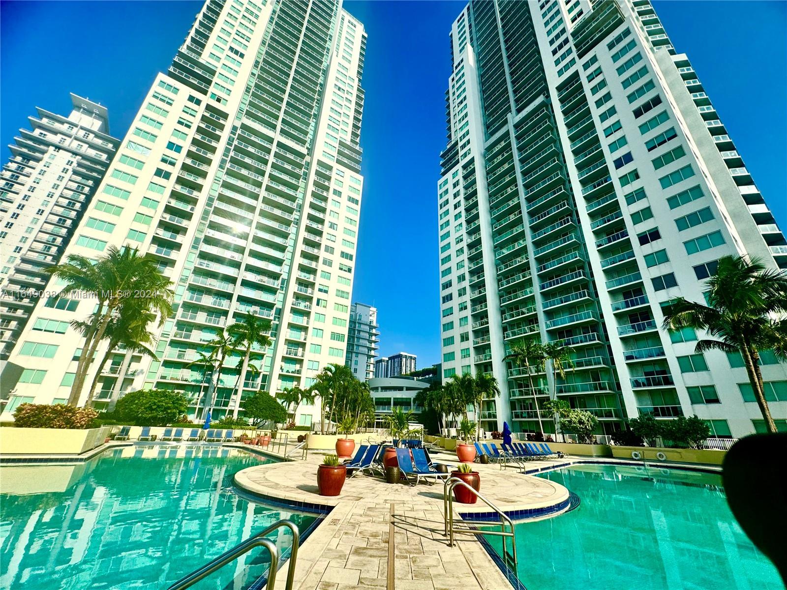 a view of swimming pool with a patio