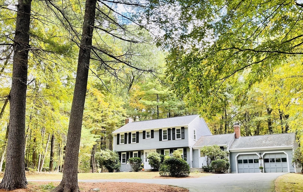 a view of a building with a tree