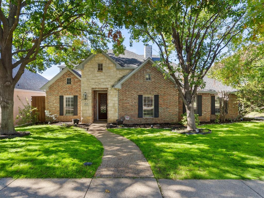 View of front of home with a front lawn