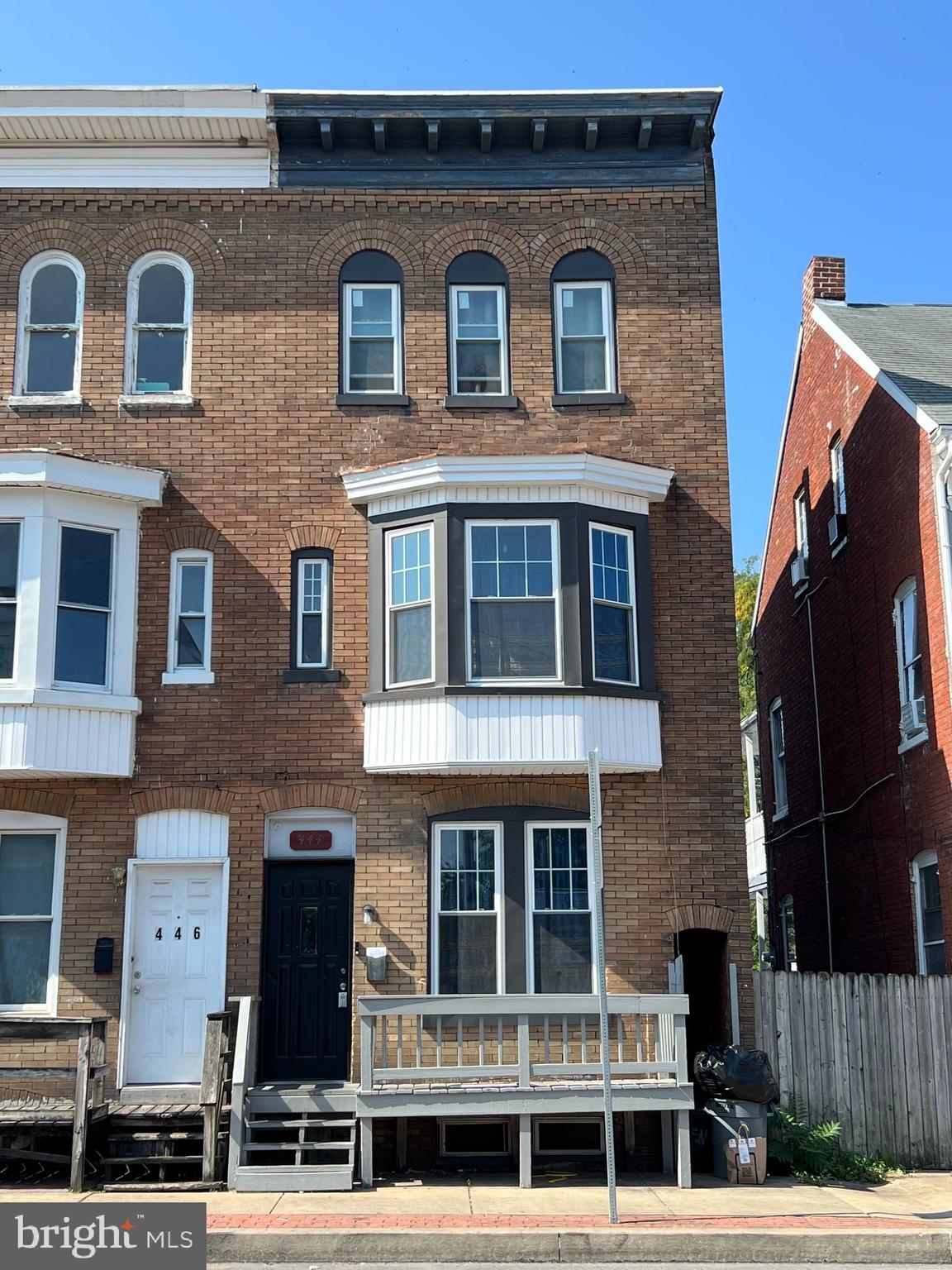 a front view of residential houses