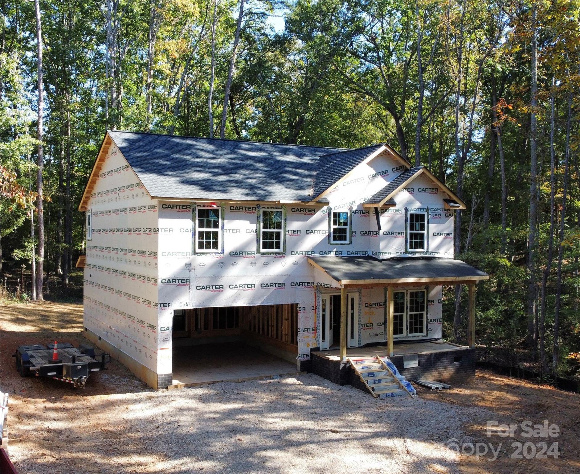 a house view with a outdoor seating space