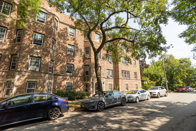 a cars parked in front of a building